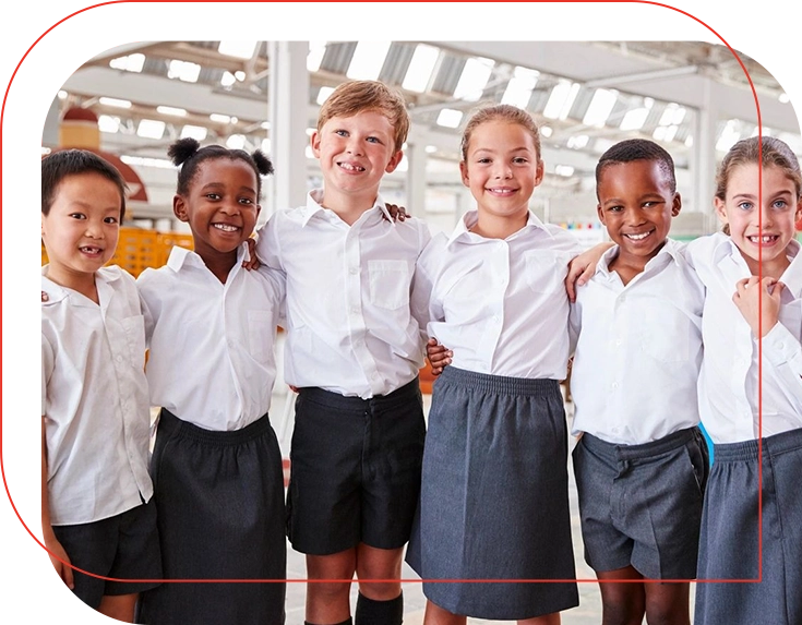 Happy schoolchildren in uniform together.